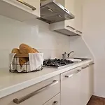 Homely With Swimming Pool In A Village Apartman Bibione